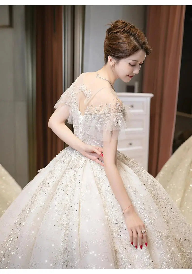 Timeless Ball Gown Off The Shoulder Tulle Sequin Beaded Long Wedding Dresses C3838 main image 1