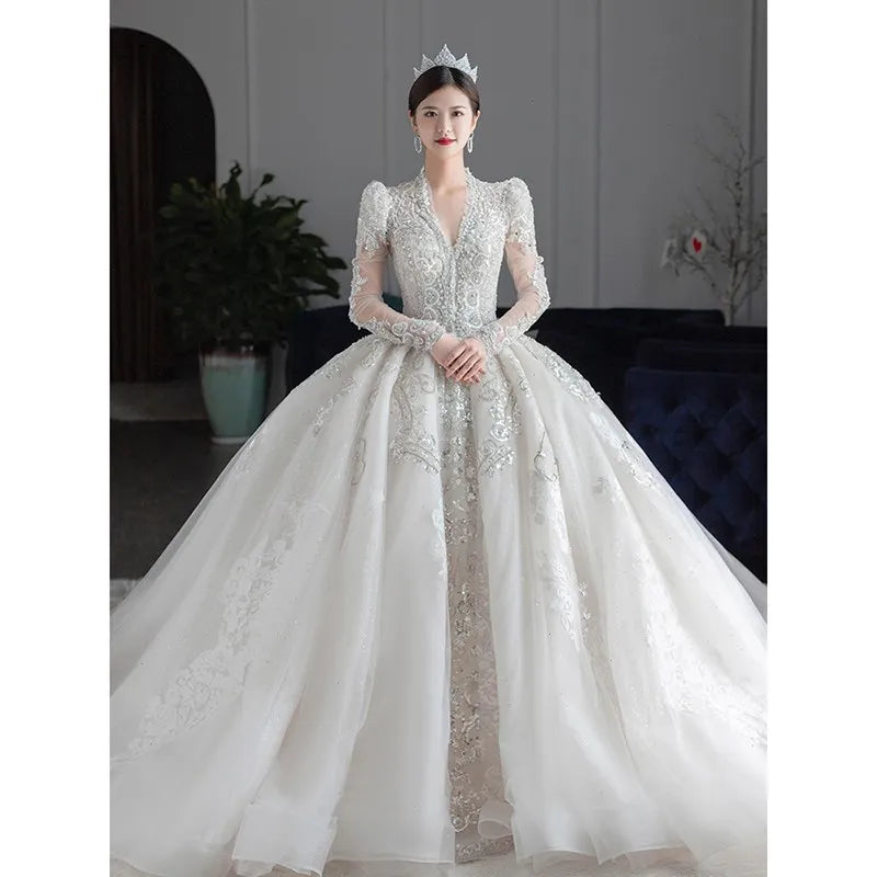 Elegant Long Sleeve Lace Bridal Gown With Train on Luulla