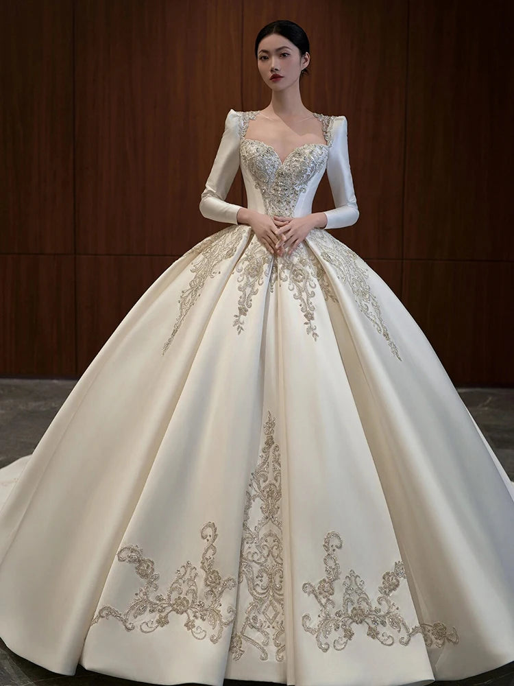 Elegant Long Sleeve Beaded Ball Gown Wedding Dress on Luulla