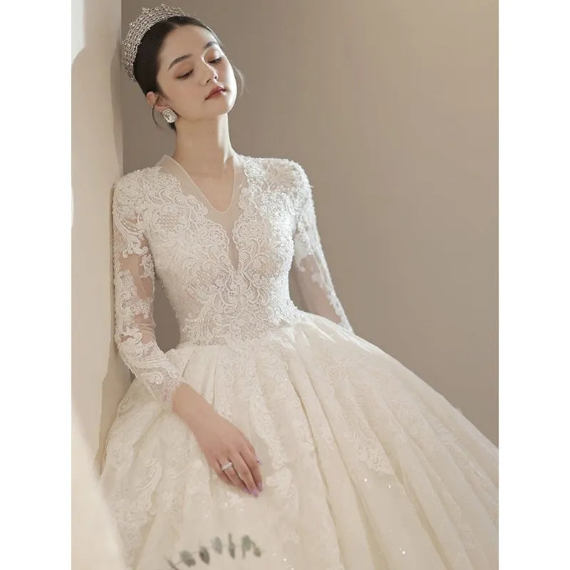 Elegant Long Sleeve Lace Bridal Gown With Train on Luulla