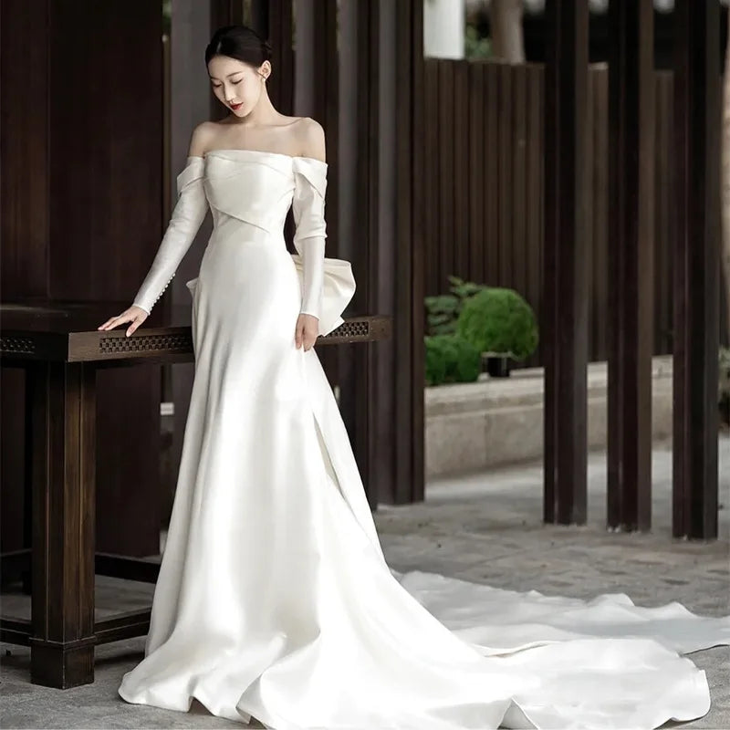 Luxury Off-Shoulder Beaded Wedding Dress with Elegant Long Train for Brides