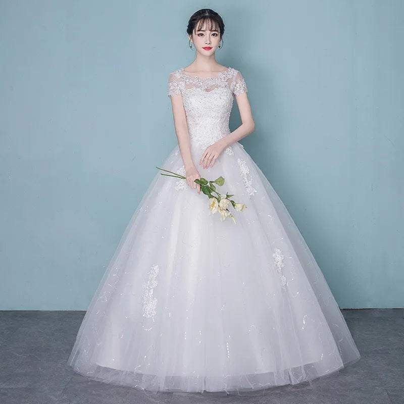 Elegant Off-the-Shoulder Long Sleeves Wedding Dress with Appliques Lace