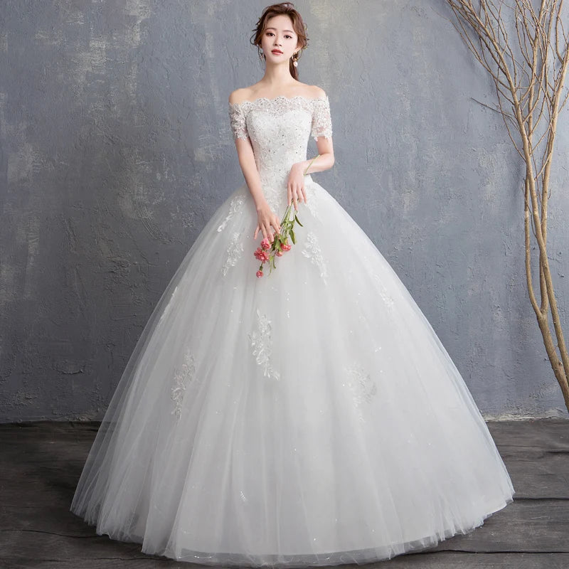 Luxury Off-Shoulder Wedding Dress - Handmade Lace Ball Gown | Femstylo main image 0